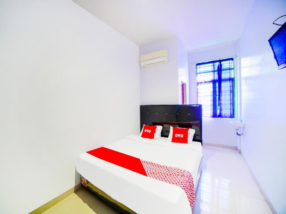 Oyo 91283 Sg Premium Guest House Medan Luaran gambar